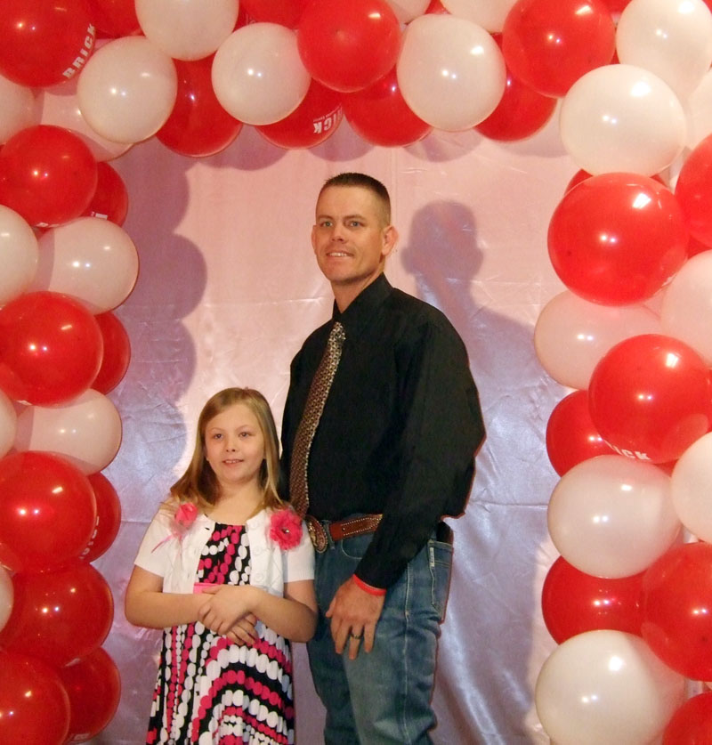 photo of a dad and daughter